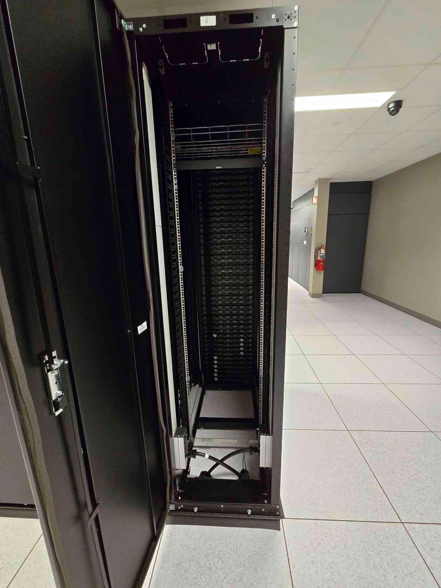Panduit Fully Enclosed Black Server Rack Cabinet with Wheels (108537)
