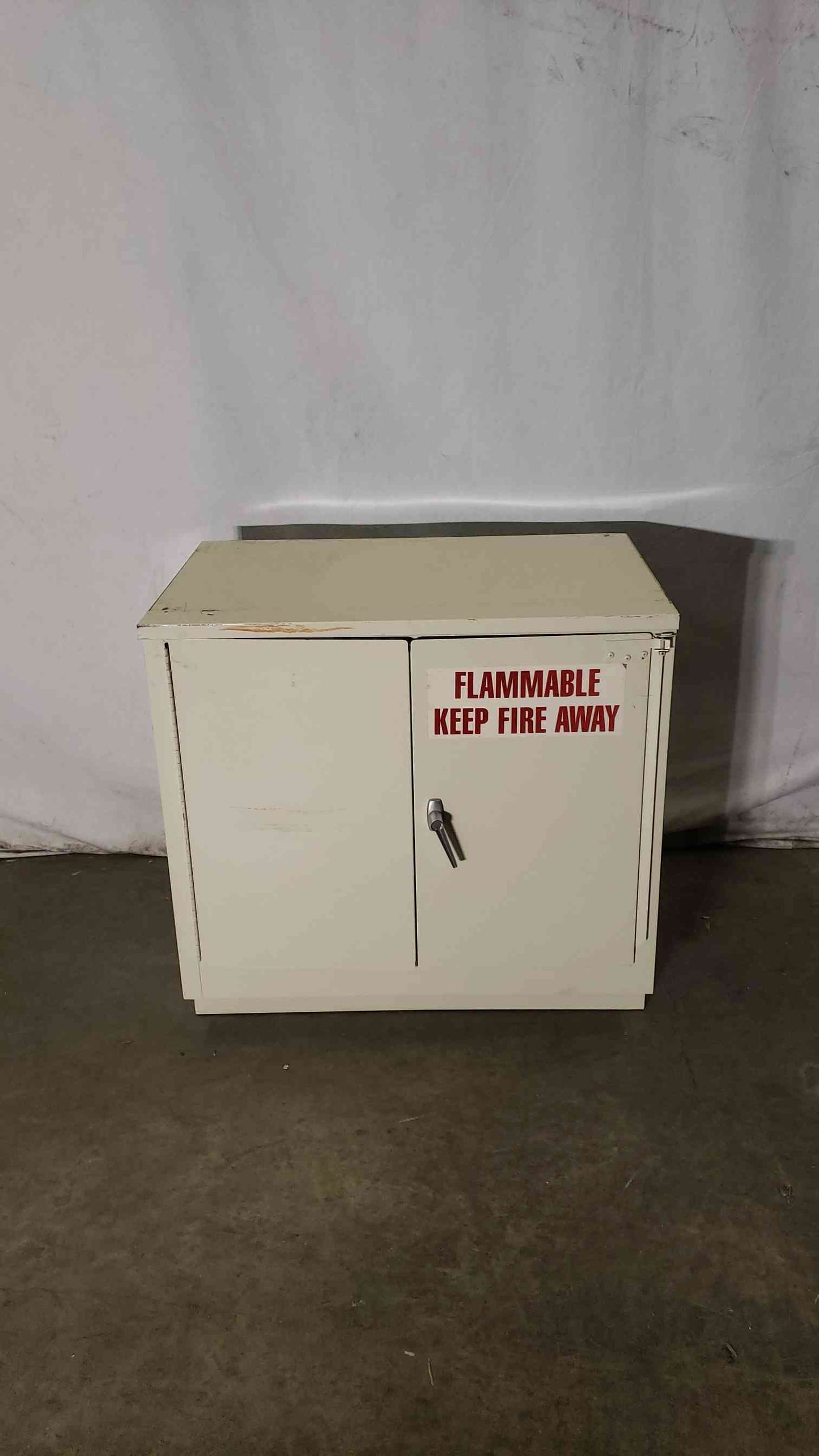 36x22x35 Flammable Tan Cabinet.(100232)