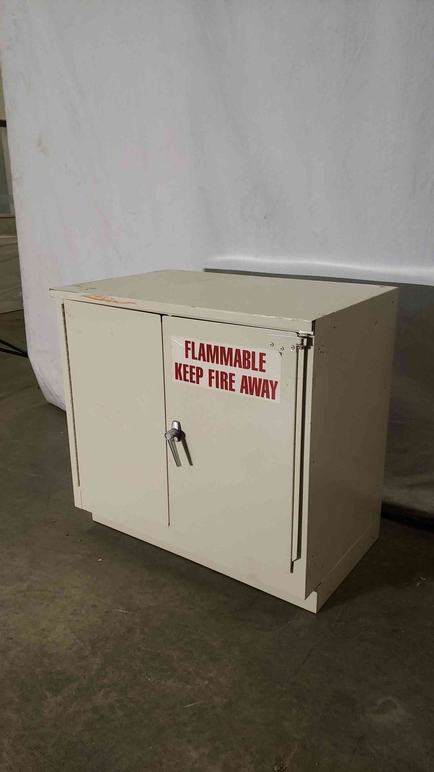 36x22x35 Flammable Tan Cabinet.(100232)