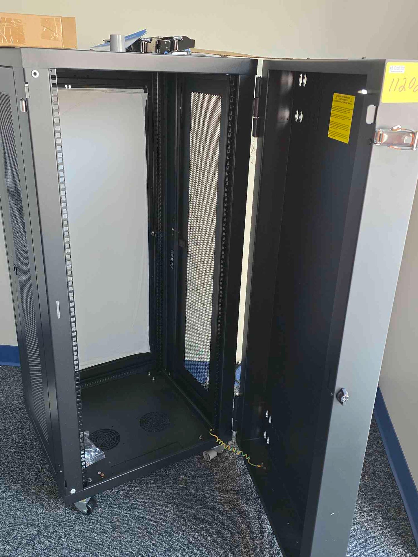 New 24U Tripp-Lite Black Server Cabinet(SKU: 112020)