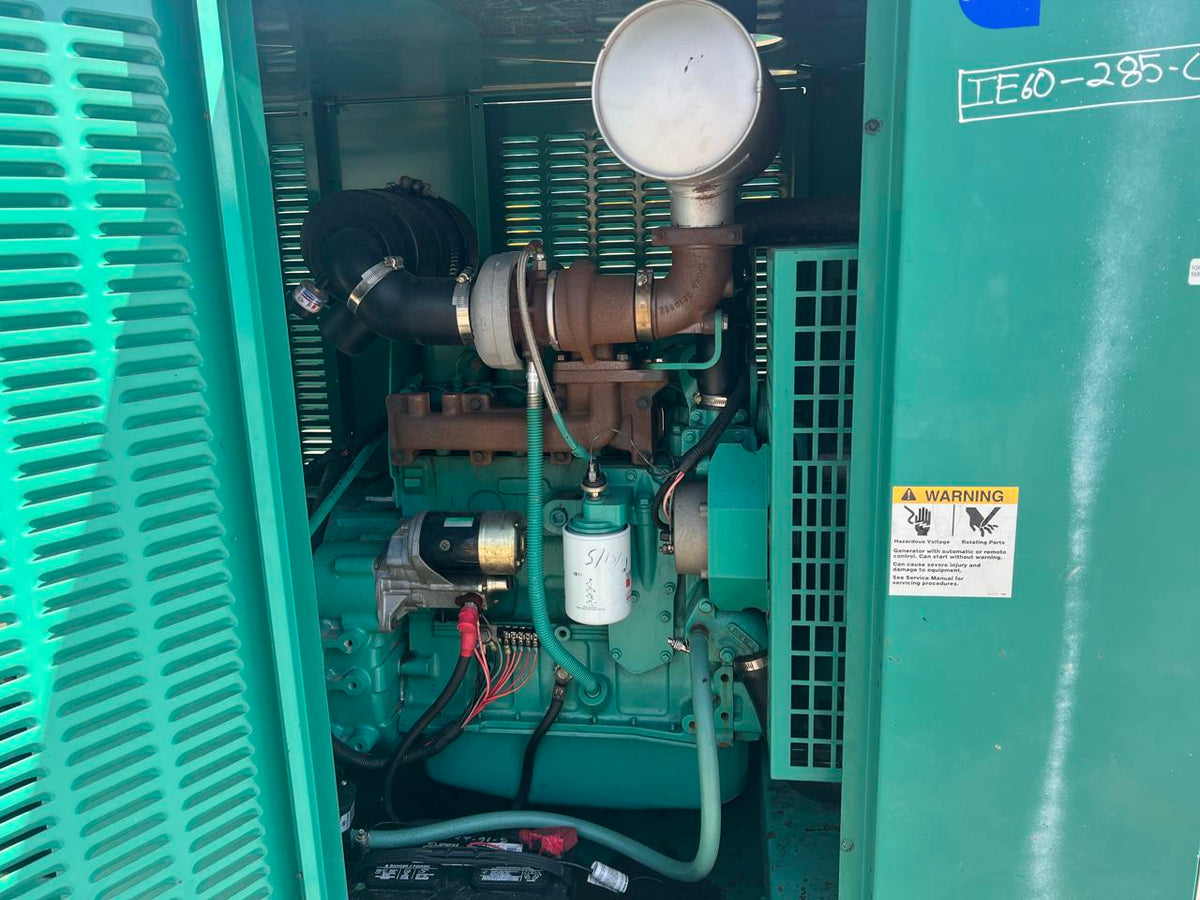 60 kW Cummins/Onan GenSet, with Enclosure and Base Fuel Tank, 3.9 Liter Cummins Diesel Engine, Year – 2002, 725 Hours