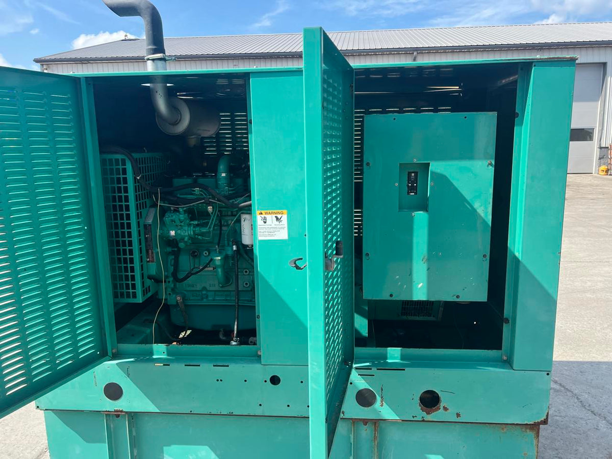 60 kW Cummins/Onan GenSet, with Enclosure and Base Fuel Tank, 3.9 Liter Cummins Diesel Engine, Year – 2002, 725 Hours