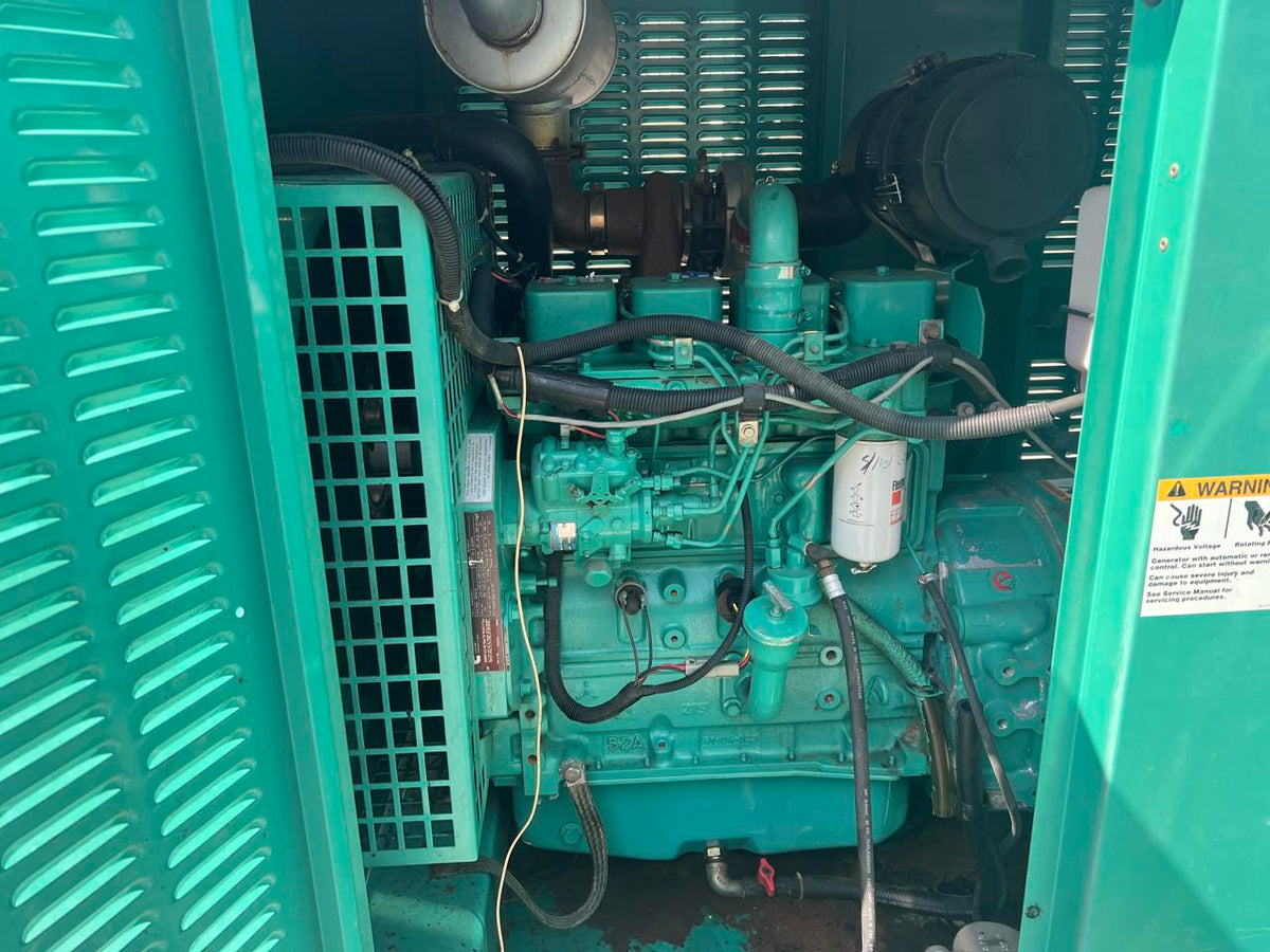60 kW Cummins/Onan GenSet, with Enclosure and Base Fuel Tank, 3.9 Liter Cummins Diesel Engine, Year – 2002, 725 Hours