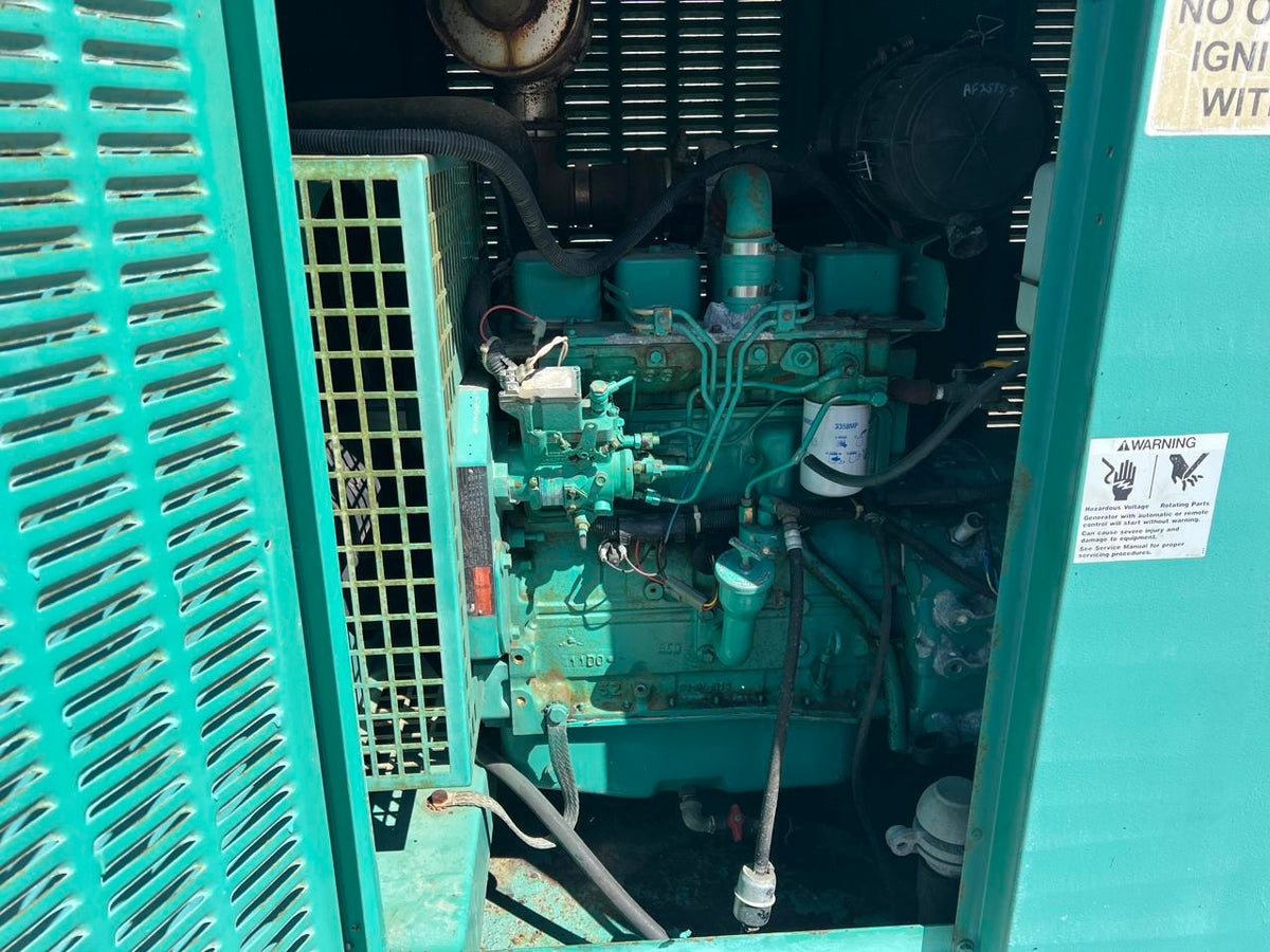 60 kW Cummins/Onan GenSet with Enclosure and Base Fuel Tank 3.9 Liter Cummins Engine, Year – 2000, 466 Hours